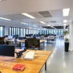 Contemporary 3rd floor office space in Grade II* Battleship Building, 179 Harrow Road W2, with wrap-around windows and natural light