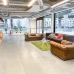 Modern 3rd floor office interior in Grade II* Battleship Building, Paddington, featuring superb natural light from wrap-around windows