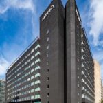 Modern double-height reception at Metro Building in Hammersmith W6, prime office space with excellent natural light