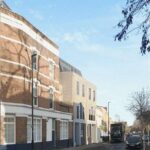Vacant corner development plot at 94 A & B Larkhall Lane, Clapham London, with planning for 5 apartments amid terraced homes