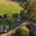 Vacant 11,928 sq ft development plot in Purley CR8 adjoining 6 Famet Walk, planning approved for three-bedroom houses with south-facing gardens
