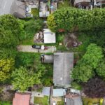 Aerial view of 18,374 sq ft residential development site on Swinton Hall Road, Swinton M27, ideal for 18 flats near train station