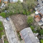 View showing the significant drop from front to rear on this cleared residential development plot in Blackburn's Corporation Park area