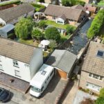 Two existing garages and driveway on prime 2,431 sq ft Sheffield land plot, Norton Lees, perfect for development investment