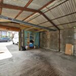 Two garages with concrete base and driveway on 2,431 sq ft land plot in Norton Lees, Sheffield, prime for development