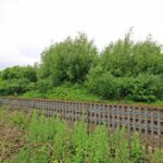 Elongated 2.07-acre freehold plot alongside railway opposite Great Sankey train station, Warrington development land for sale
