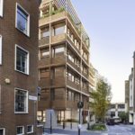Architectural rendering of premium 127k sq ft office scheme by Allford Hall Monaghan Morris on corner site near Farringdon Crossrail