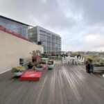 Modern 4th floor office space in Grade II* Battleship Building, 179 Harrow Road, featuring abundant natural light from wrap-around windows
