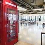 Spacious 3rd floor office in Grade II* Battleship Building, 179 Harrow Road W2, featuring natural light from wrap-around windows