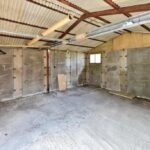 Concrete base with two garages and driveway on 130ft development plot in Norton Lees, Sheffield South Yorkshire