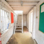 Internal balcony view of former squash court development site on Kneller Road, Twickenham TW2, near stadium & stations