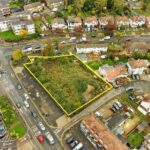 Cleared 0.16ha development land at busy A112/A110 junction in Waltham Forest, planning for 40 apartments & commercial space