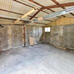 Existing two garages and driveway on 2,431 sq ft development land in Norton Lees, Sheffield