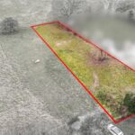 Mature trees providing privacy to development-ready grassland on Vineyards Road, Northaw, Potters Bar, Hertfordshire