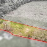 Mature trees screening frontage of grassland development plot on Vineyards Road, Northaw, Potters Bar EN6