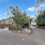 Useful garage on 0.02 acre corner land parcel, View Street, Moldgreen Huddersfield HD5, ideal for extension or parking