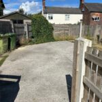 Empty building plot behind 14 Station Road in Lostock Gralam CW9, approved for detached house with planning ref 24/0323/FUL