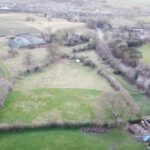 Two paddocks on 3.40-acre Cheshire land near A49 Tiverton, natural hedges, fencing, stunning Beeston Castle views for equestrian use